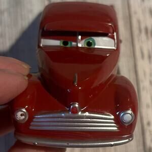 Red and white Smokey auto service from cars